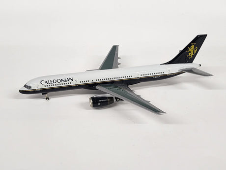 White Boeing 757 die-cast model aircraft in brown box packaging.