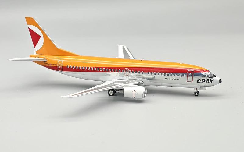 IF733CP0725P | InFlight200 1:200 | Boeing 737-317, CP Air C-FCPG with stand