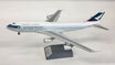 Boeing 747-300 die-cast model aircraft in Cathay Pacific livery displayed on stand.