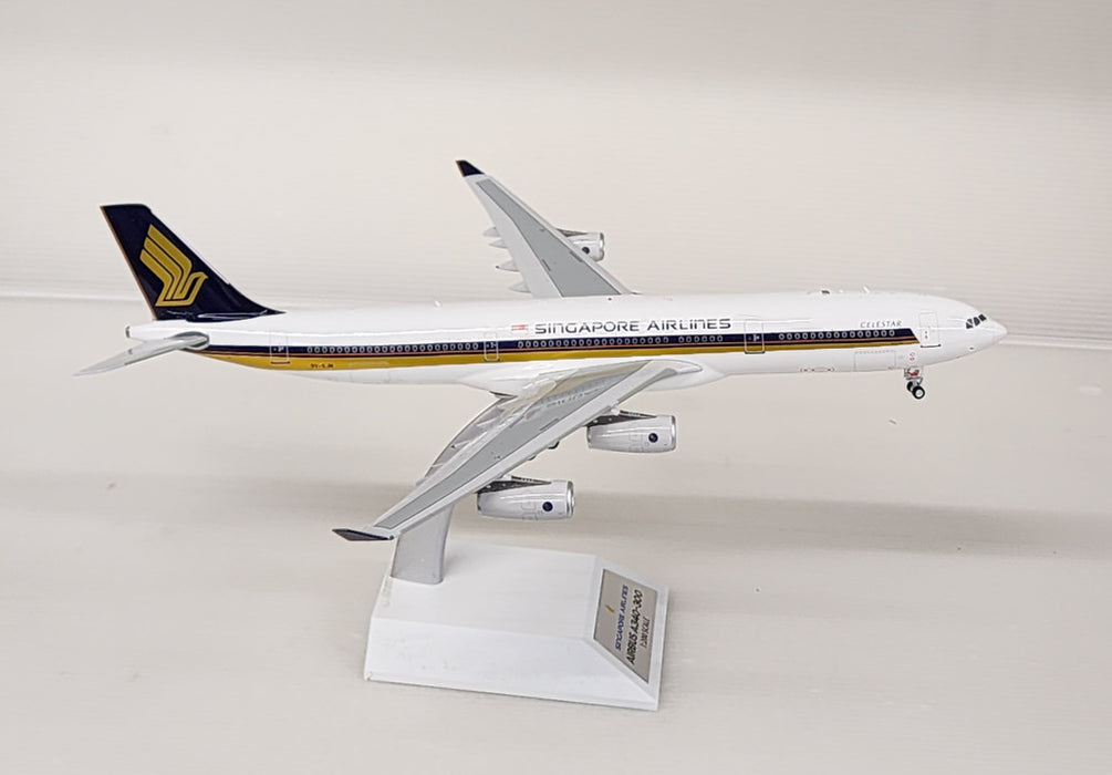 WB-A340-3-013 | WB Models 1:200 | Airbus A340-313 Singapore Airlines 9V-SJM (with stand)