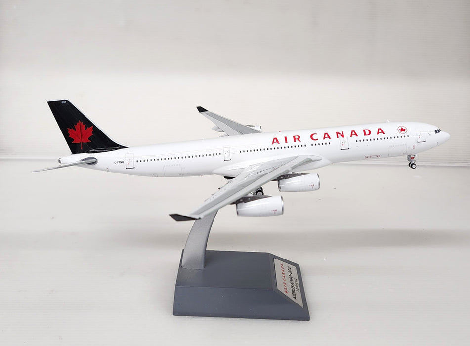 B-343-AC-TNQ | Blue Box 1:200 | Airbus A340-313 Air Canadc C-FTNQ with stand