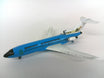 A vintage 1:250 scale blue Braniff International Boeing 727-100 model.