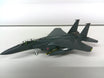 Plastic 1:100 scale McDonnell Douglas F-15E US Air Force model on a display stand.