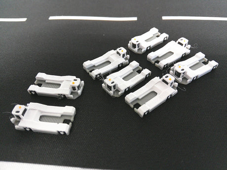 White aircraft tugs for narrow-body planes, 1:400 scale airport accessories.