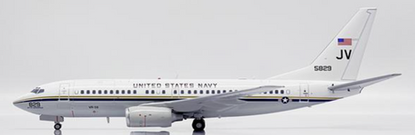 Detailed die-cast model airplane of a Boeing C-40A Clipper in US Navy livery with registration 165829.