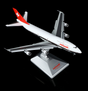 Boeing 747-300 aircraft model in Swissair livery with chocolate stripe and lowered flaps.