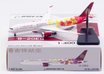 Diecast Boeing 787-9 Dreamliner model in Juneyao Airlines livery.