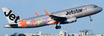 Die-cast metal model Airbus A320-200 in Jetstar Airways Flying with Pride livery.