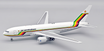 Boeing 767 die-cast aircraft model with stand in polished finish.