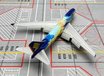 Boeing 747-400 die-cast aircraft model in Singapore Airlines livery with flaps down.