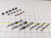 White airport tug and dolly ULD cargo trailer vehicle models in 1:400 scale.