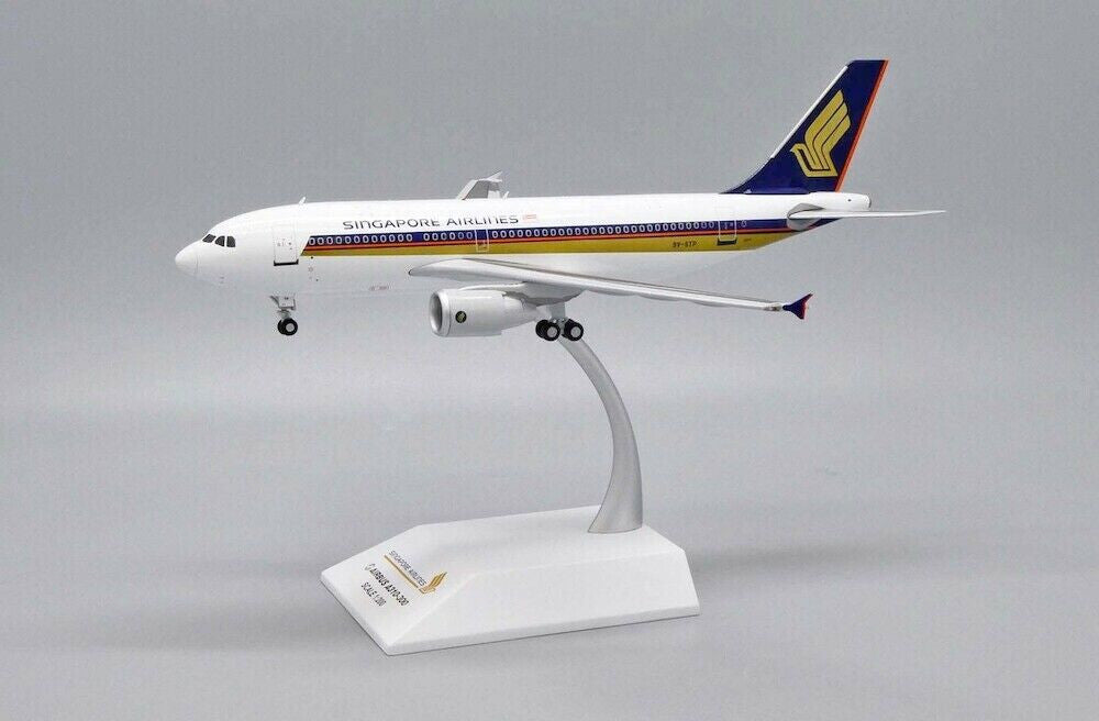 EW2313001 | JC Wings 1:200 | Airbus A310-300 Singapore Airlines 9V-STP (with stand)