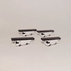 Four white narrowbody belt bag loader GSE airport vehicle models in 1:200 scale by AvGeek Models.
